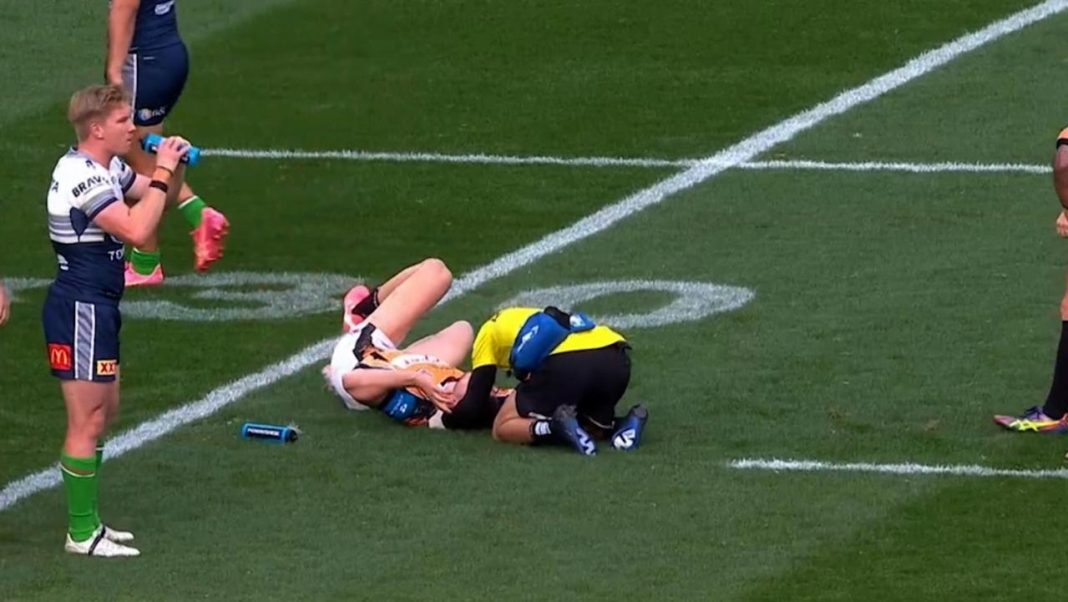 Wests Tigers star Adam Doueihi fractures skull, rushed to hospital after sickening clash